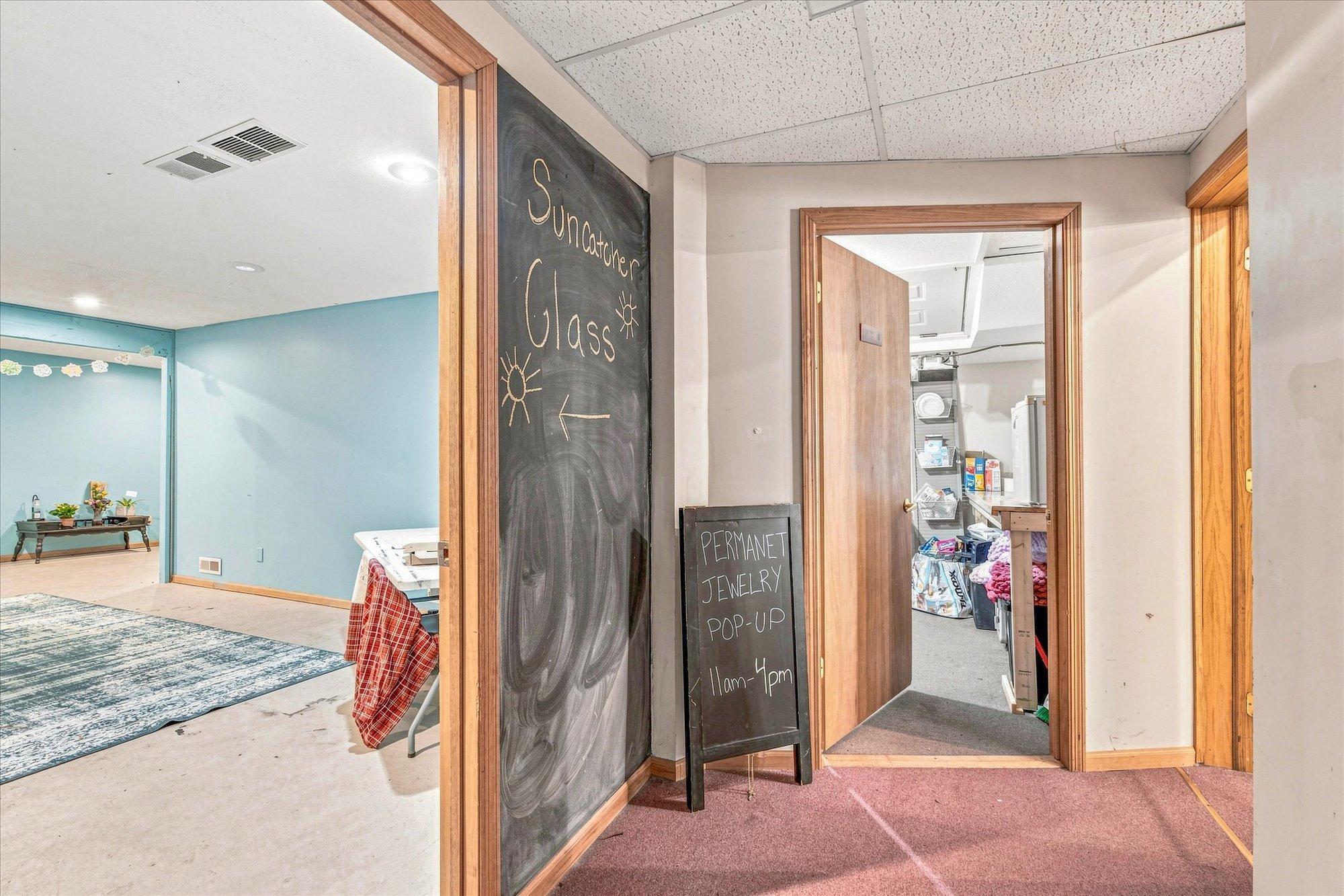 113 Hallway leads to two additional rooms