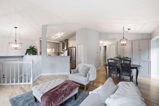 Living room with vaulted ceilings, open, airy, and cozy.