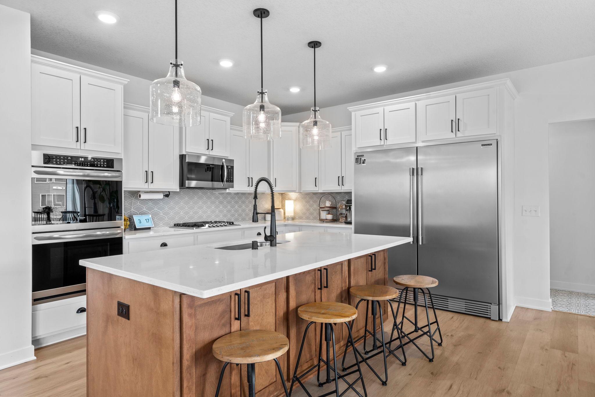 Double Oven And Oversized Fridge