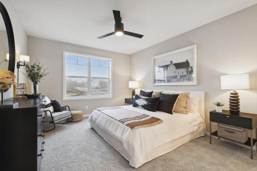 The expansive owner's suite located on the main level is the perfect get away to recharge, relax and renew.