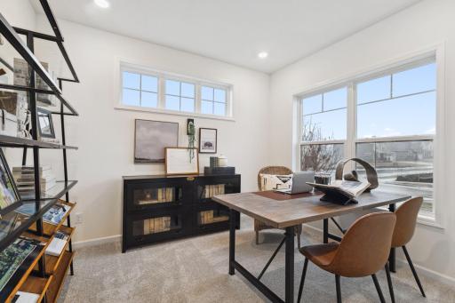 The den space makes for a perfect office space or an additional sitting area on the main level.