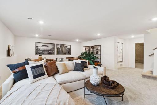 If you are typically the host for holiday get togethers? You can continue that tradition as this home features this huge lower level rec room.