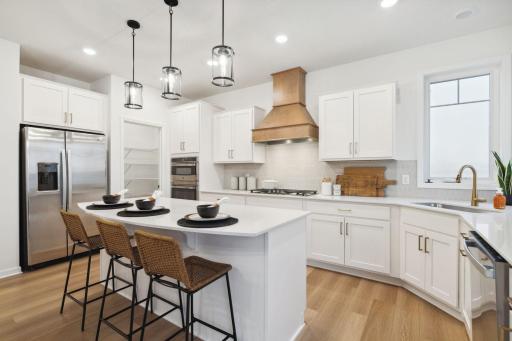 This kitchen rivals those of large two story homes. The kitchen is such a gathering place for todays households and this home delivers as the ideal place to host friends and guests alike.