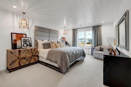 Need a space for guests? This home features another perfectly sized bedroom located in the finished lower level. (model photo)