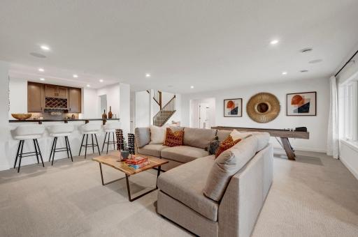 Alternate view of the stunning lower level rec room. (model photo)