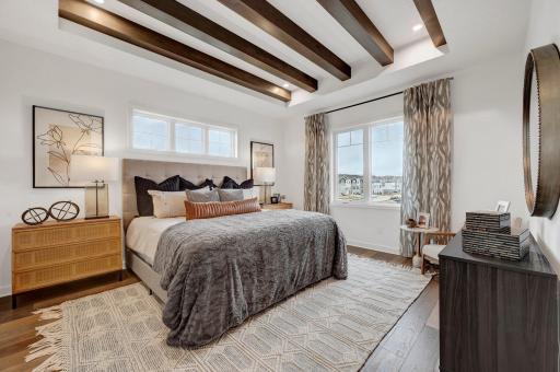 The expansive owner's suite is the perfect getaway to recharge, relax and renew. (model photo)