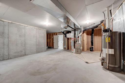 The mechanical room is spacious enough for your additional storage needs. (model photo)