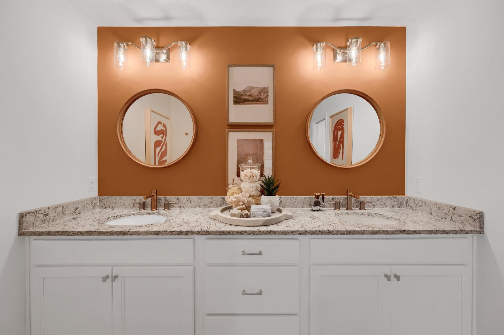 The owner's bath has everything you are looking for with a large two sink vanity, walk in shower and look at all the storage space! (model photo)