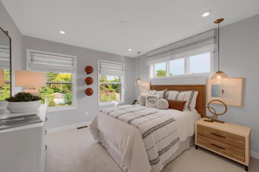 This home features perfectly sized bedrooms along with the owner's suite on the upper level. (model photo)