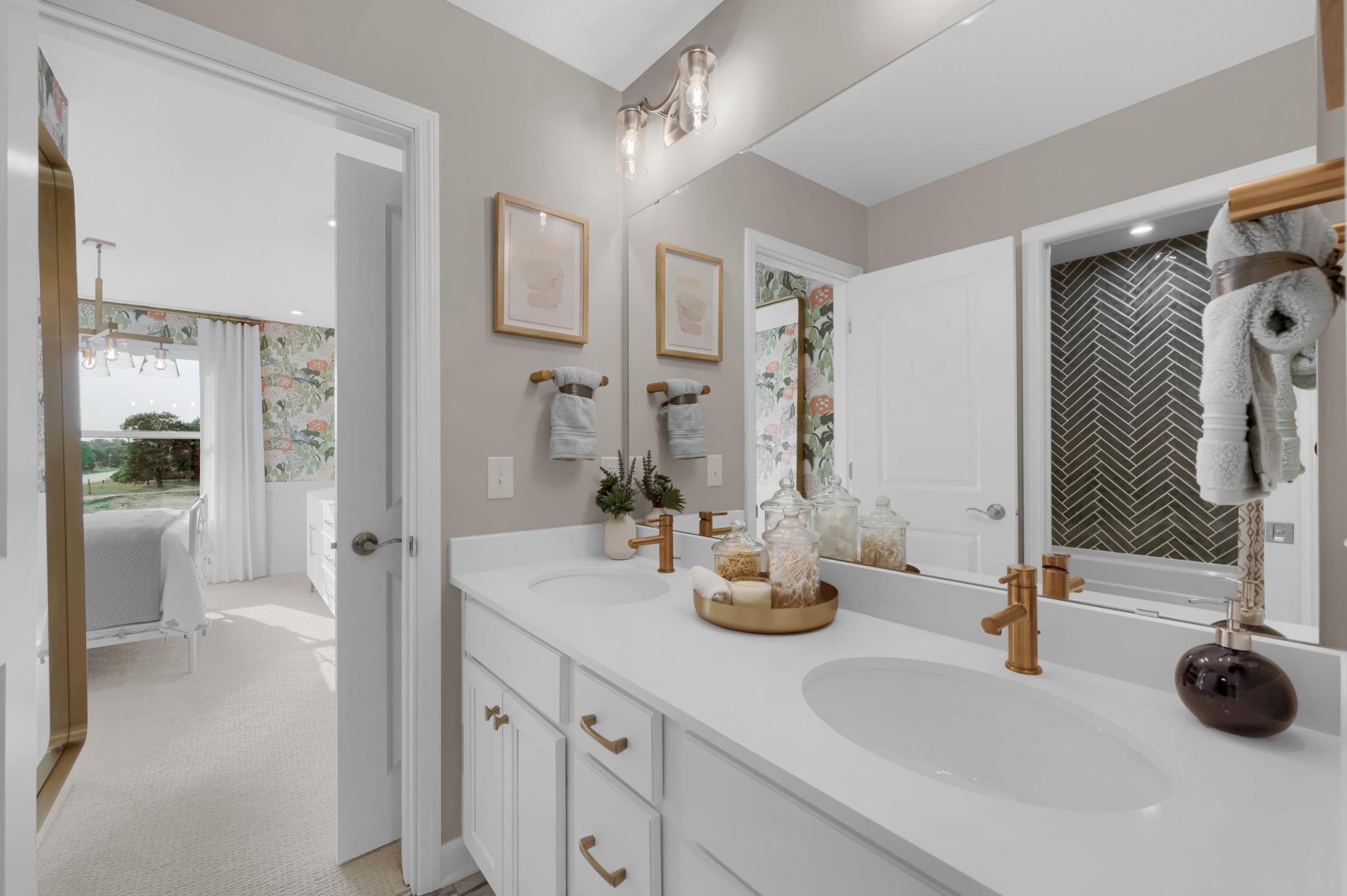 This home has the ideal bed and bath configuration with space for both household members and guests. (model photo)