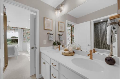 This home has the ideal bed and bath configuration with space for both household members and guests. (model photo)