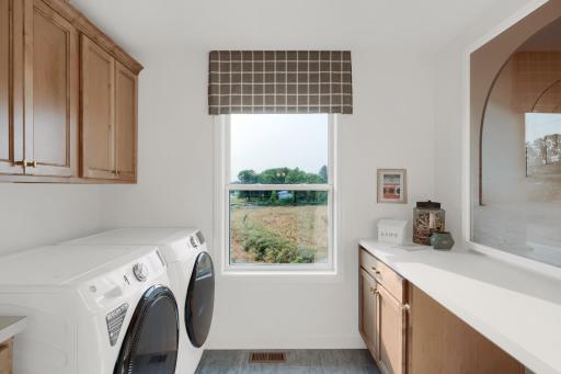 A second floor laundry room is almost essential for today's busy families. (model photo)