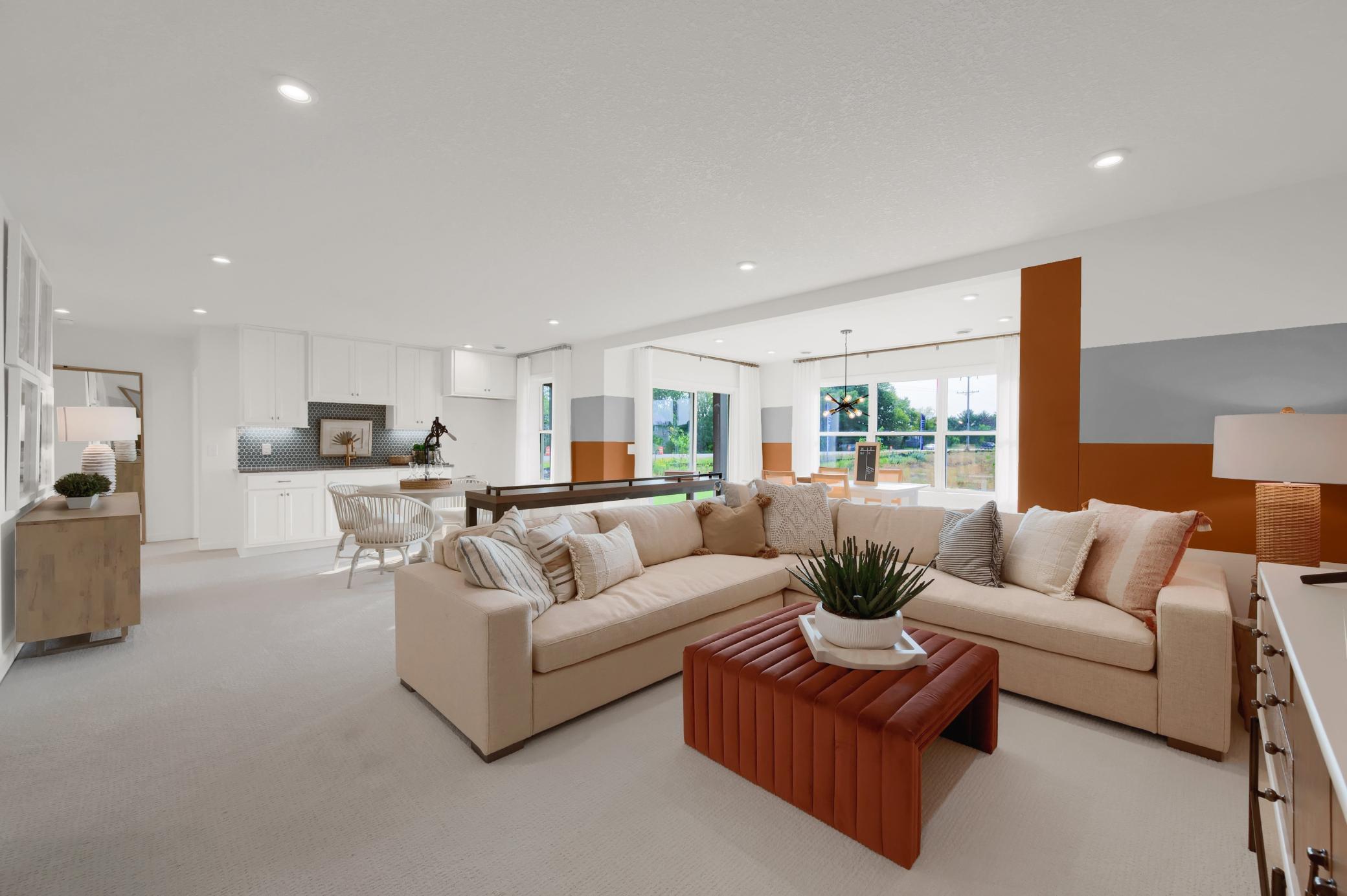 If you are typically the host for holiday get togethers? You can continue that tradition as this home features this huge lower level rec room. (model photo)