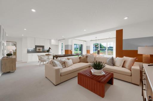 If you are typically the host for holiday get togethers? You can continue that tradition as this home features this huge lower level rec room. (model photo)