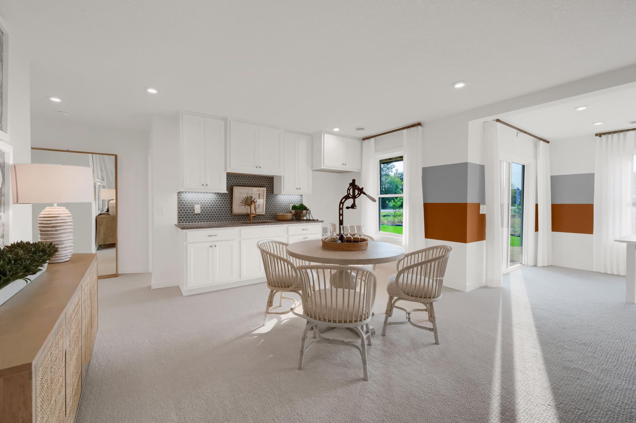 The lower level rec room is ideal for games, movies or a poker night! (model photo)