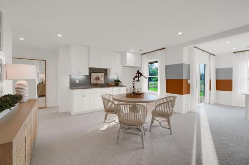 The lower level rec room is ideal for games, movies or a poker night! (model photo)