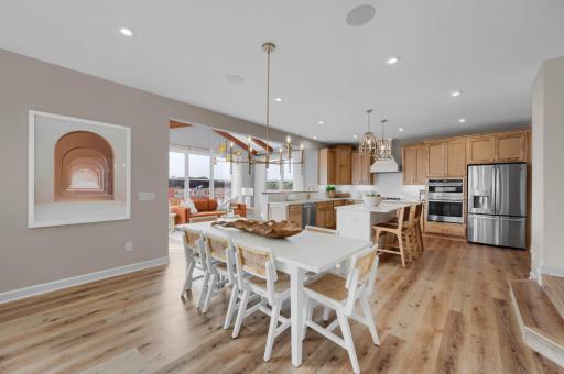 The open concept design is the ideal combination of open areas and designated spaces, perfect for gathering together and spreading out. (model photo)
