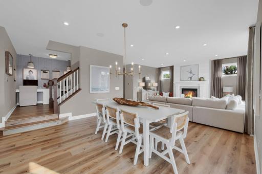 Alternate view of the dining room, leading to the open stair case and tech nook. (model photo)