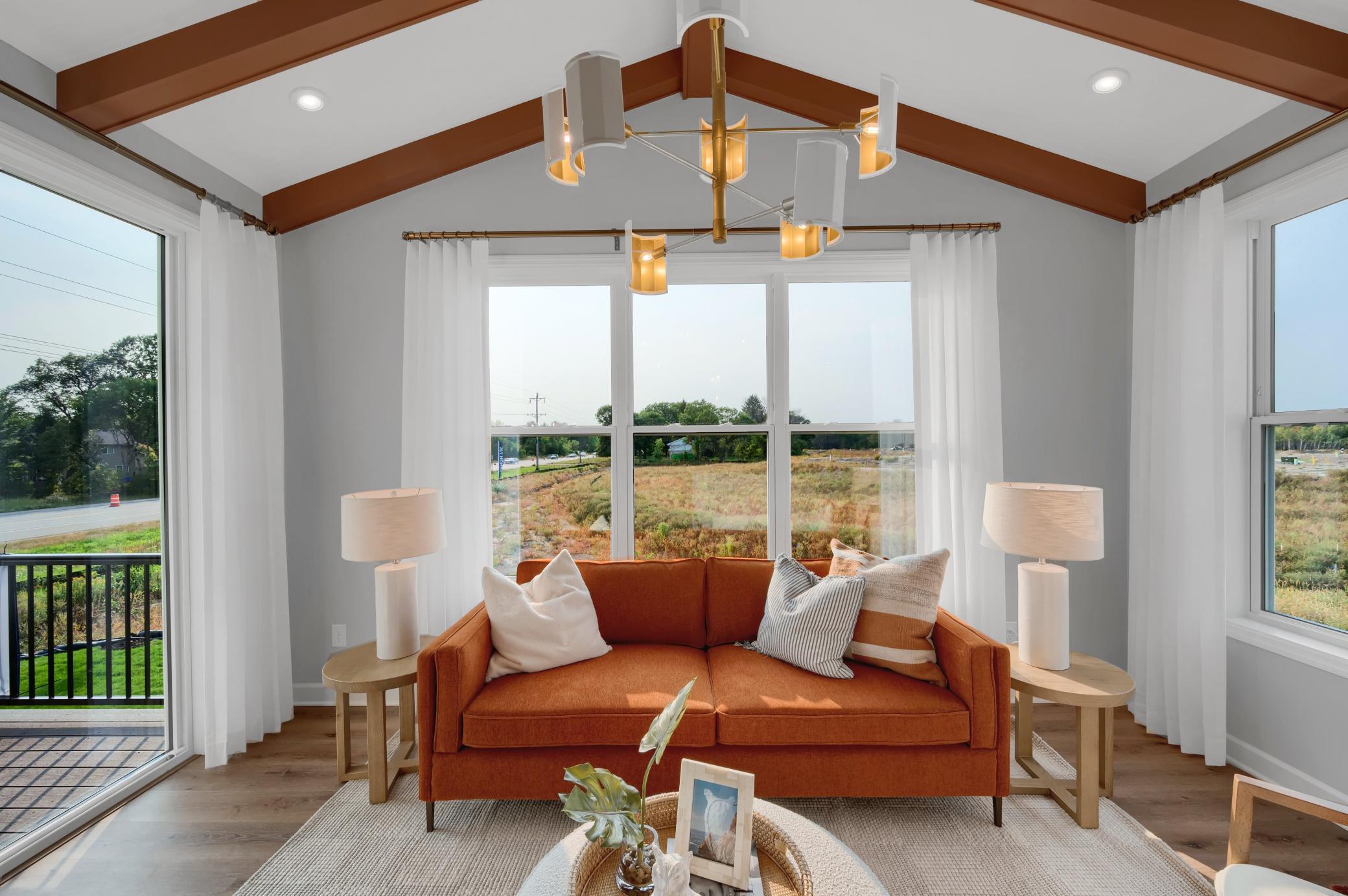 Imagine enjoying a cup of coffee watching the sun rise in the morning room. (model photo)