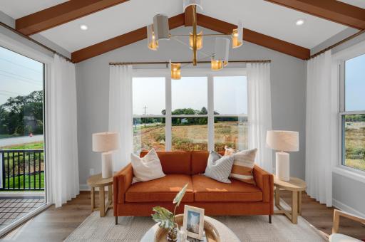 Imagine enjoying a cup of coffee watching the sun rise in the morning room. (model photo)