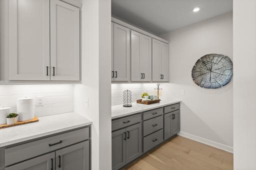 The butler's pantry is an ideal space for added meal preparation and kitchen organization. (model photo)