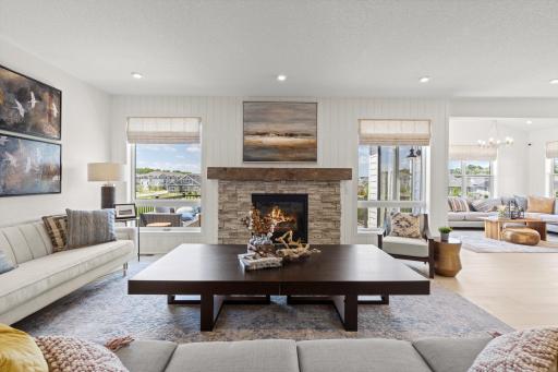 The fireplace provides beauty and function to the family room. (model photo)