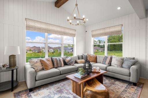 The Morning Room provide another sitting area within the home and transitions to future outdoor living spaces. (model photo)
