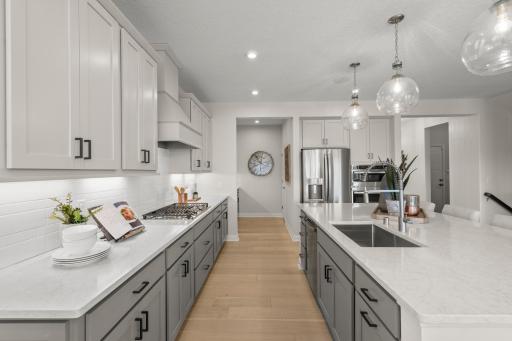 Not enough counter space is often a frustration with most homes, as you can see this home has an abundance of counter space perfect for those who like to host friends and family for get togethers. (model photo)