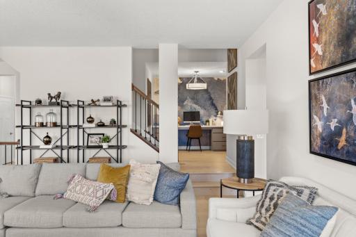As you go upstairs you will find this convenient tech nook. (model photo)