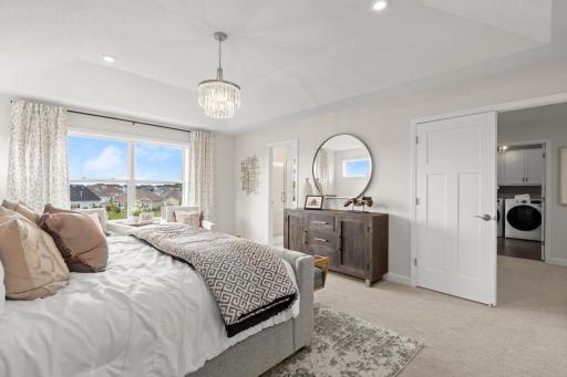 The expansive owner's suite is the perfect get away to recharge, relax and renew. The owner's suite even includes a sunny and comfortable sitting room. (model photo)
