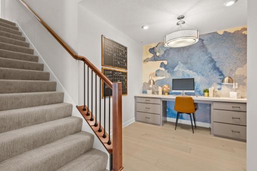 The tech nook is perfect for keeping the household organized and can be used as a work from home space or a great homework spot. (model photo)