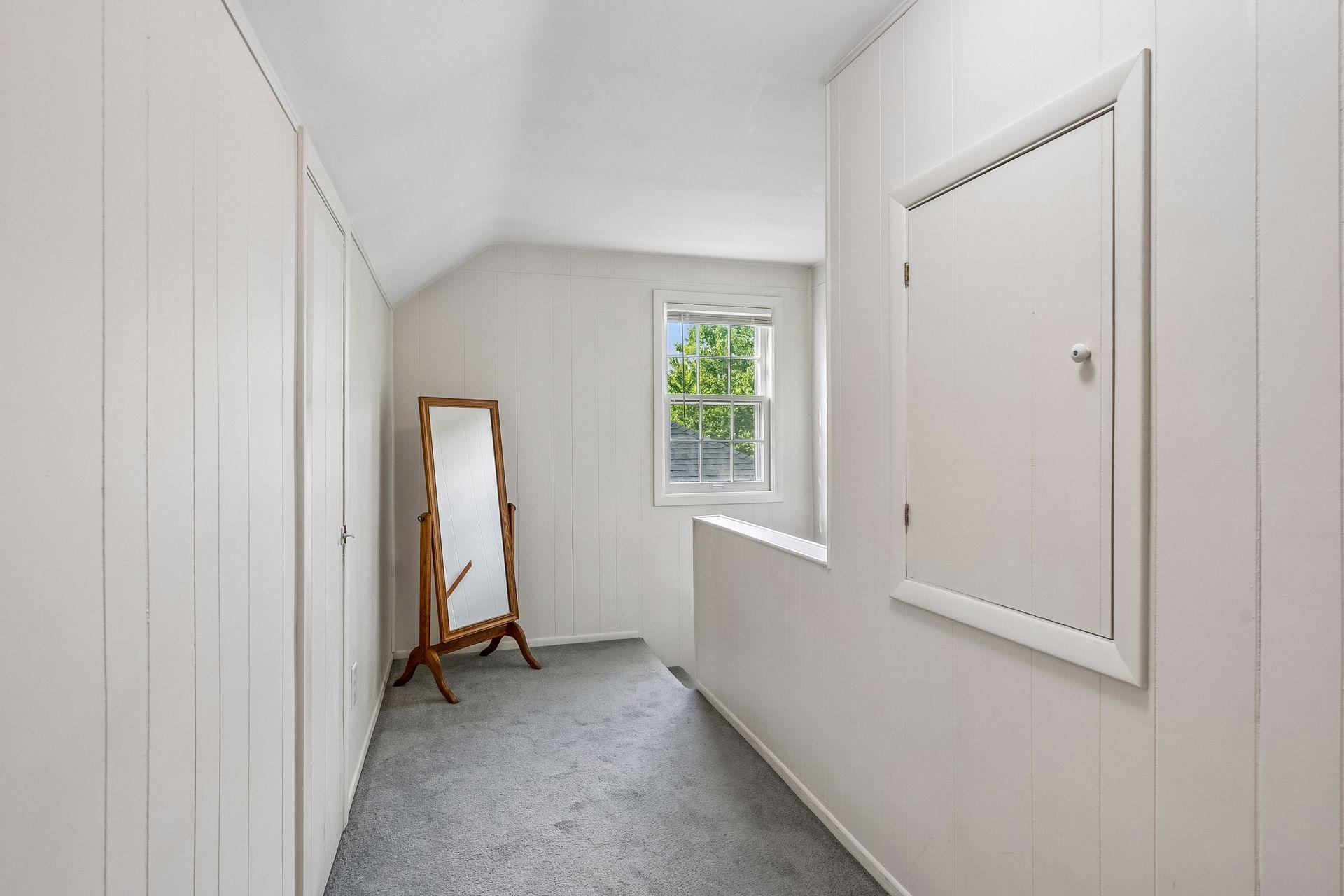 Upper level hallway. Great ceiling height!