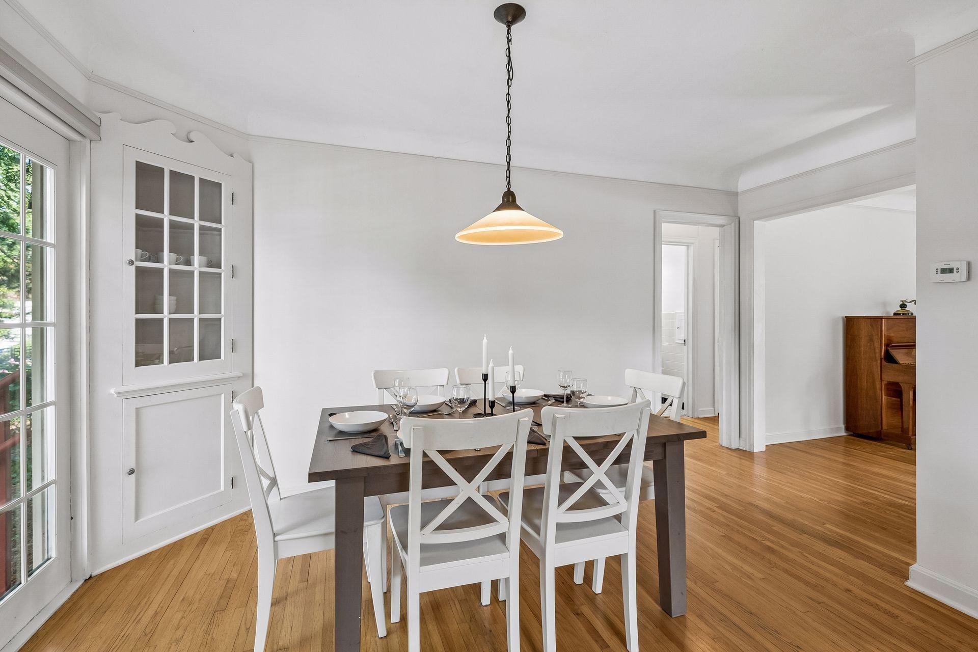 Spacious dining room. Original hardwood floors.