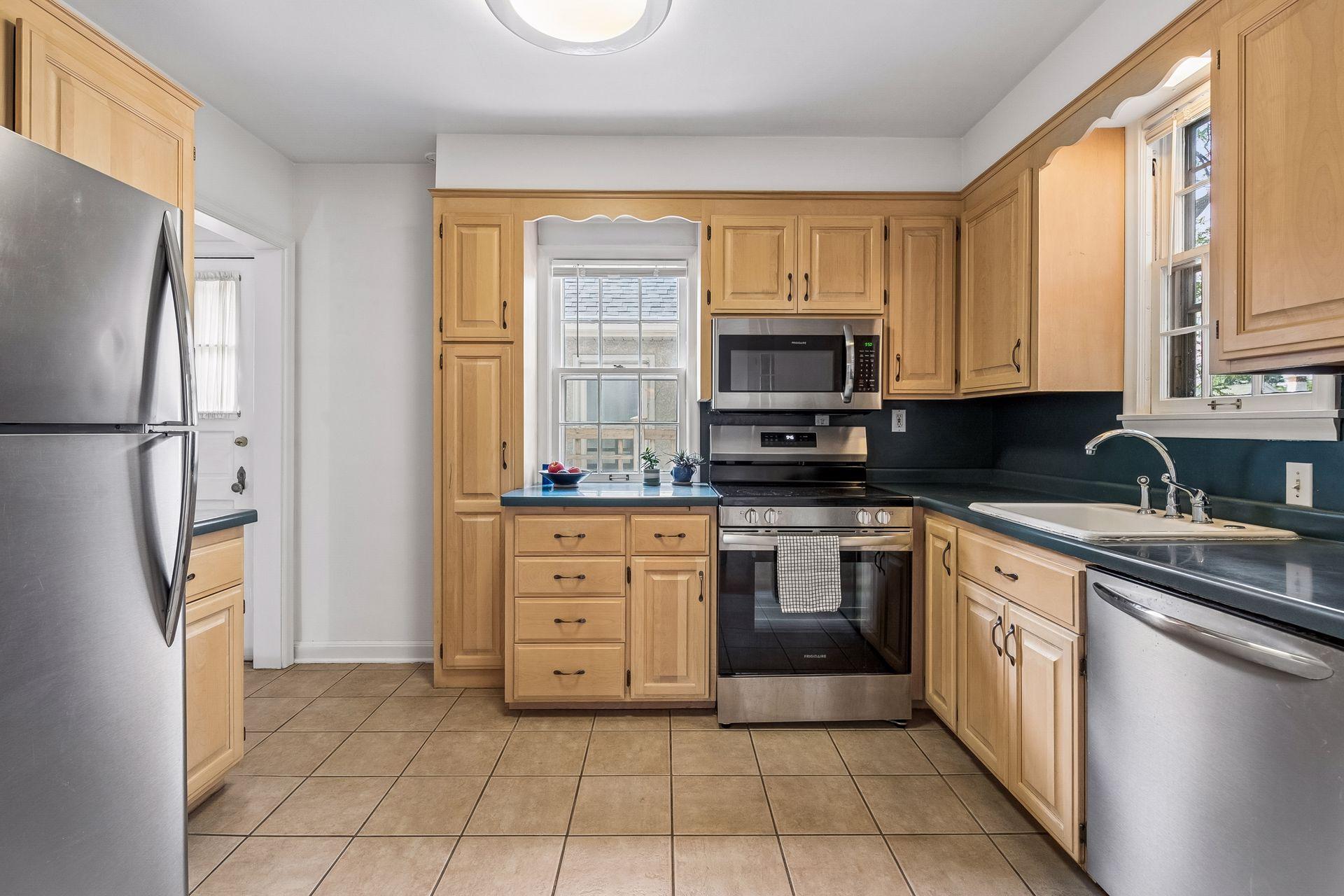 Tile floors and tons of cabinetry.