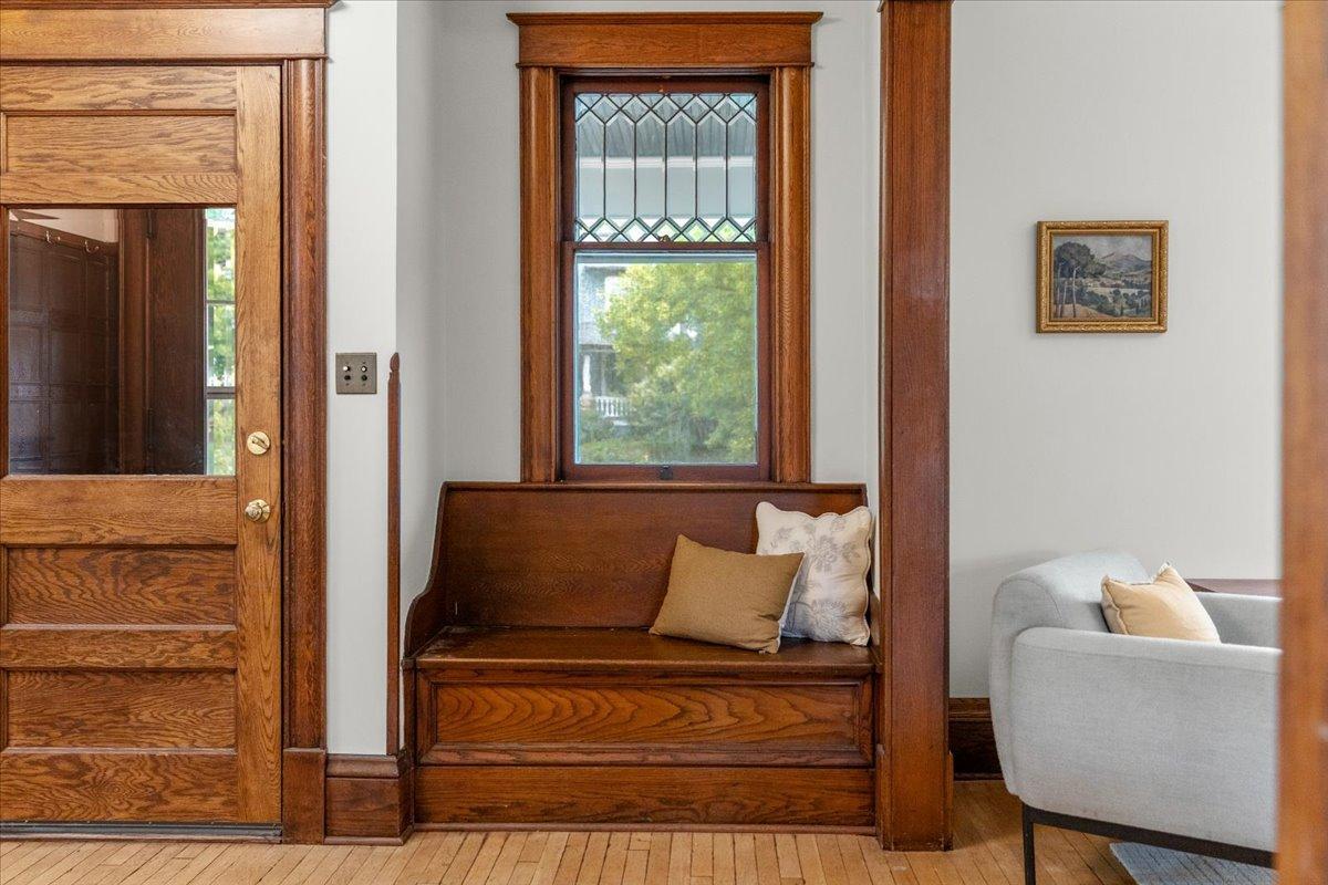 Entry way featuring a built in bench