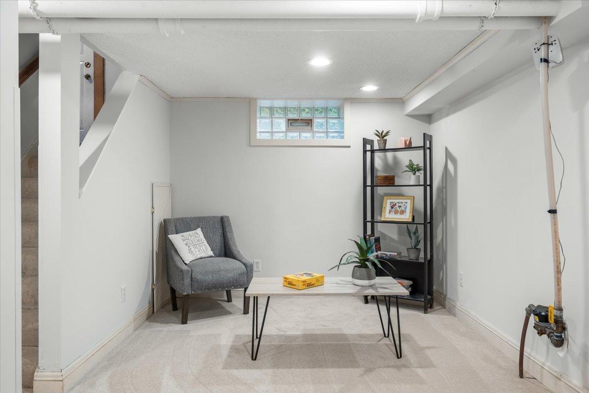 Alternate view of lower level-the photo features the water line...yep that can be concealed in an HGTV kinda way.