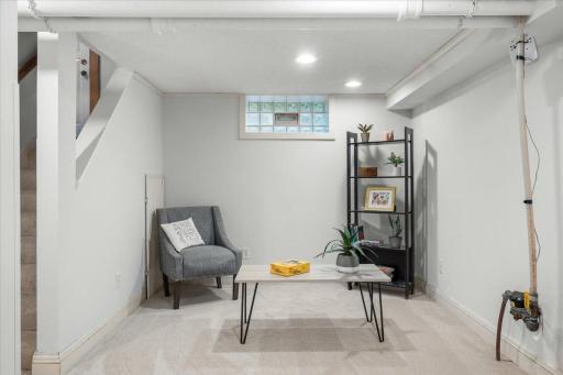 Alternate view of lower level-the photo features the water line...yep that can be concealed in an HGTV kinda way.