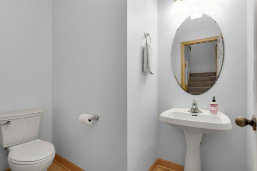 Main floor powder room-all bathrooms have new toilets