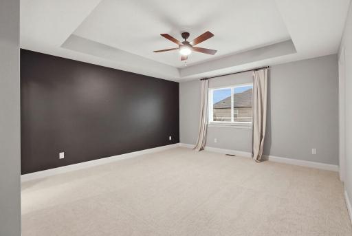 Primary Bedroom with tray ceiling actual