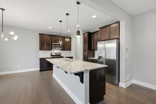 Kitchen with extended Island, stainless appliances