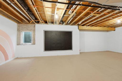 Unfinished lower level, stubbed for a bathroom, ready for your vision