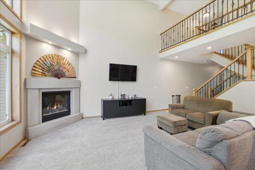Vaulted ceilings, spacious living room. Special Stone fireplace. Entertainers dream floorplan, perfect for family's.