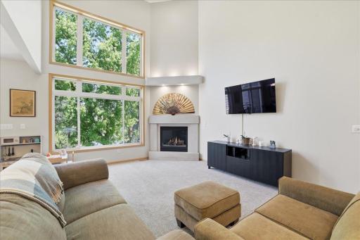 Floor to ceiling, vaulted wall of windows.