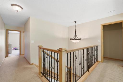 Upper level masterpiece. This spacious, incredible floorplan. 3 bedrooms on one level. Luxurious, wrought iron railings from top to bottom. (All 3 floors and catwalk, a rare detail to find).