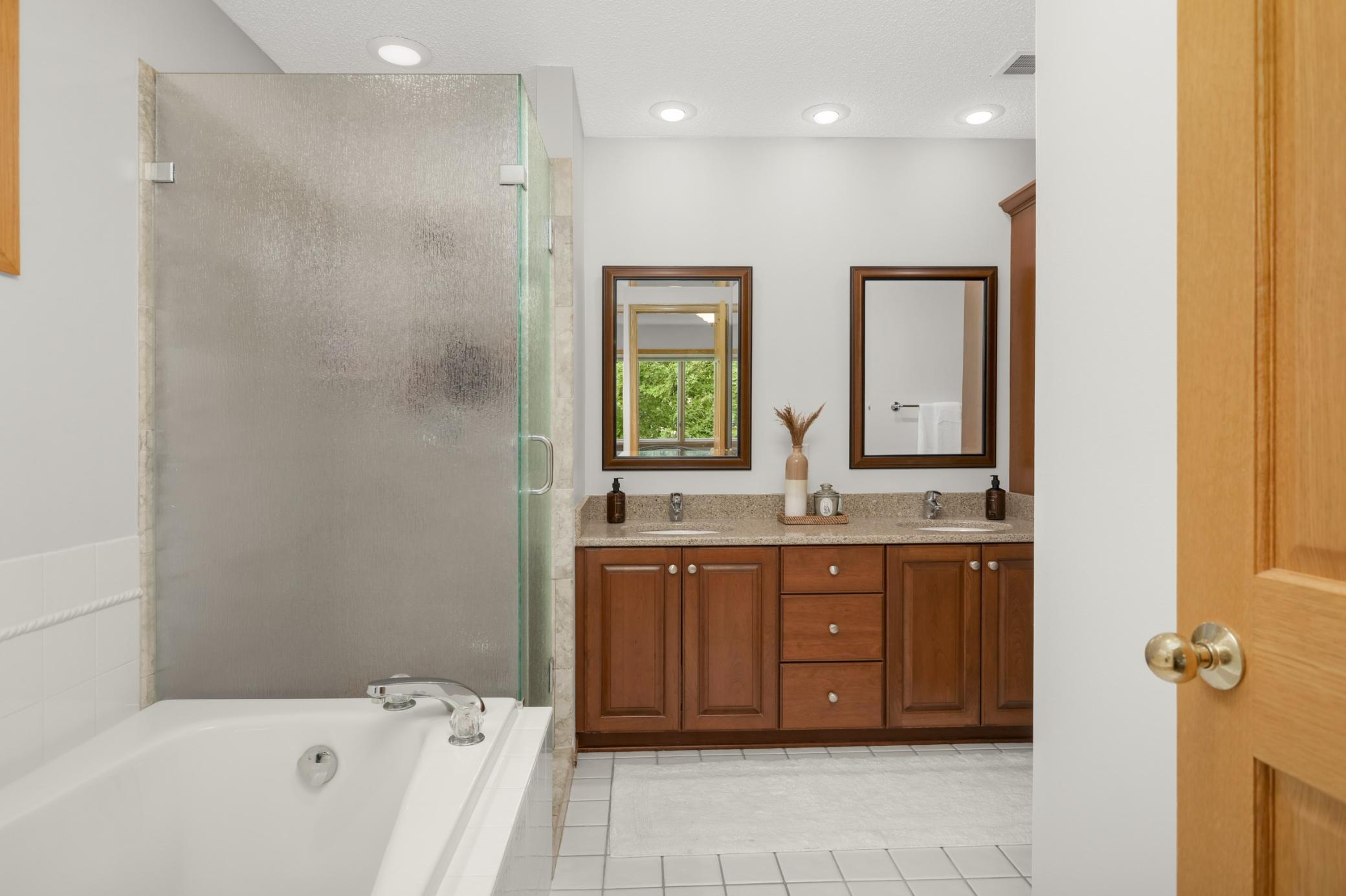 Primary bath with separate tub & shower, plus double vanity