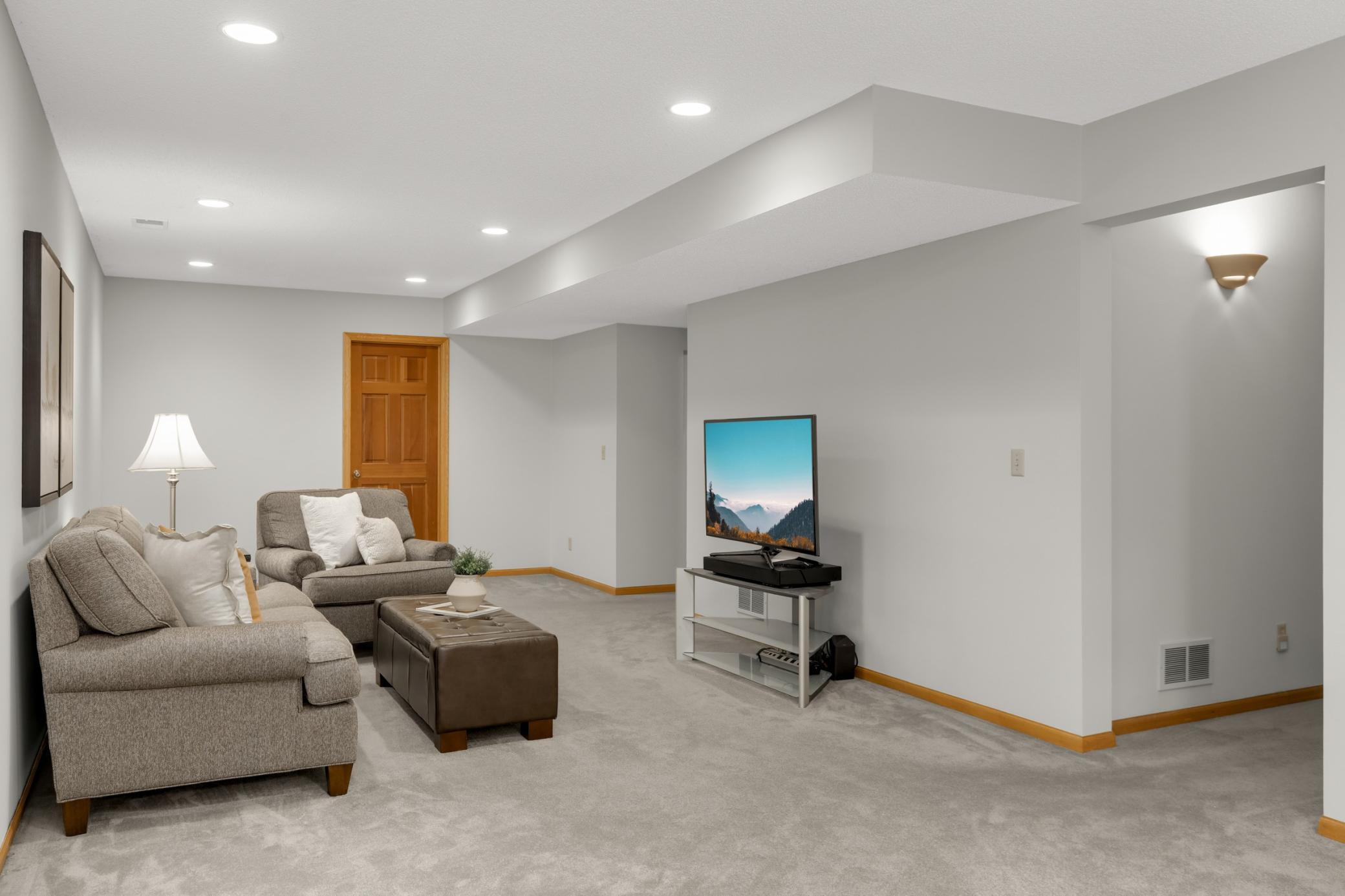 Off the family room is a 240 sq ft storage room that could be a great exercise or hobby room