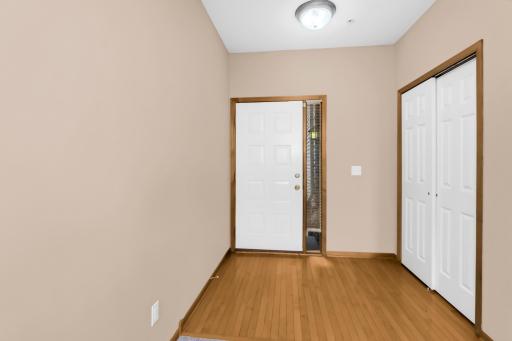 Hardwood floors in the front foyer with generous coat closet. Room to add a bench!