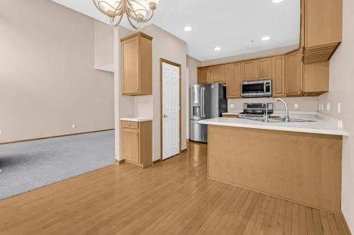 There is a pantry closet and bartop seating