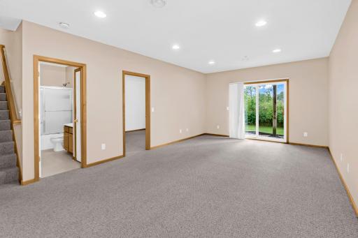 Your finished walk out basement! The secluded 3rd bedroom resides down here.