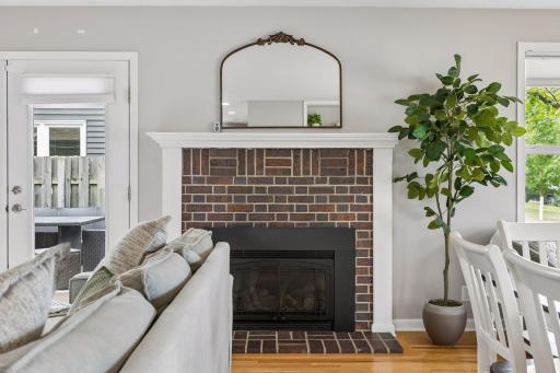 Cozy Gas Fireplace in Open Concept Living and Dinning Room